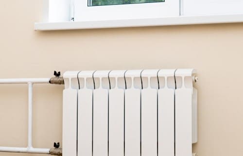 chauffagiste Quint-Fonsegrives - un radiateur sous une fenêtre en PVC