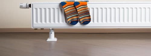 chauffagiste Cadolive - Des chaussettes sur un radiateur