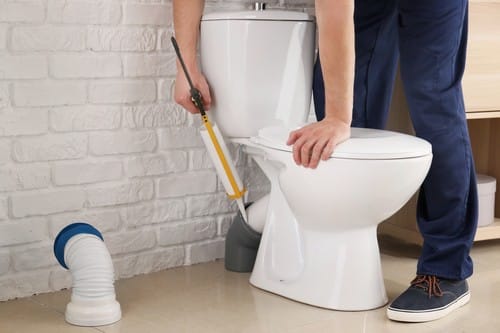 Comment déboucher une toilette avec du bicarbonate de soude et du