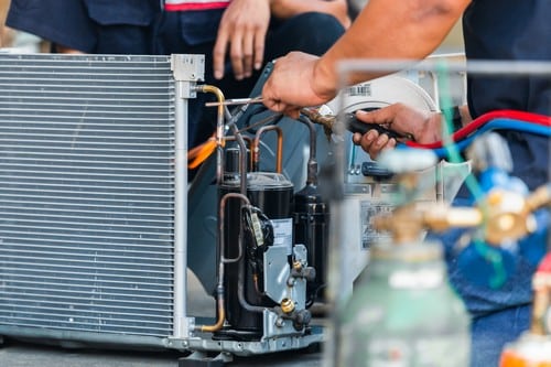 Climatisation Sainte-Geneviève-des-Bois - les bons artisans - intervention sur une clim extérieure