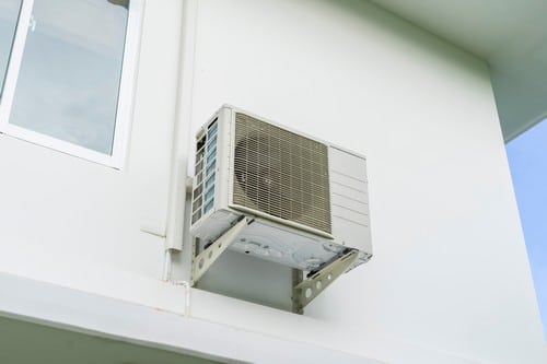 Climatisation Seysses - visuel d'un climatiseur en extérieur sur un bâtiment
